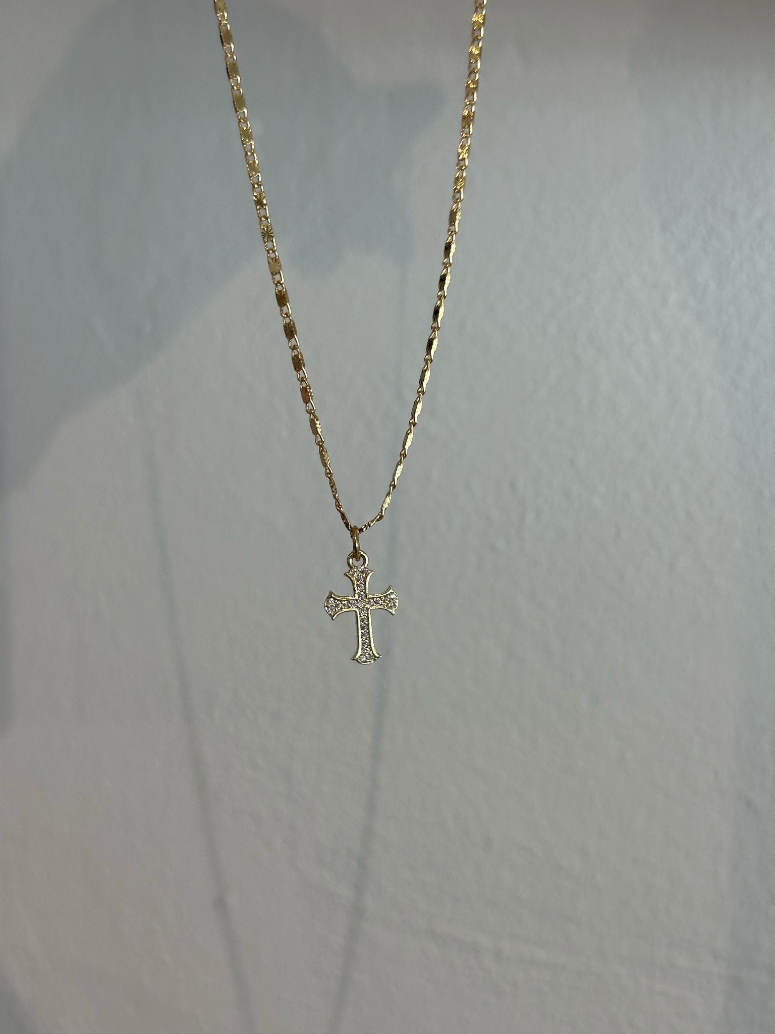 #75 DAINTY CROSS NECKLACE CPSTATEMENT